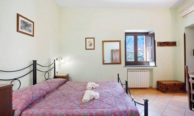 Gragnano Apartamento | Habitación 'Amalfi Con Vista Monti E Cortile' con terraza compartida, jardín compartido y Wi-Fi