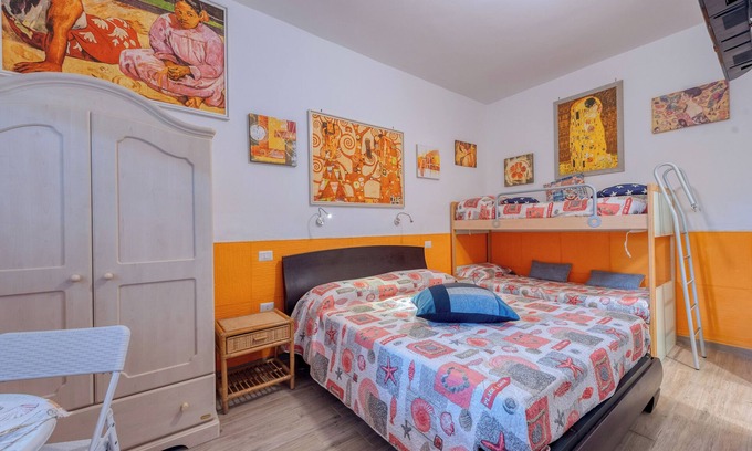 Manduria Apartamento | Habitación 'Camera 4' con jardín compartido, Wi-Fi y aire acondicionado.