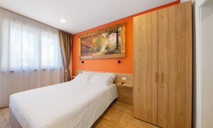 Domegge di Cadore Apartamento | Habitación 'Camera M Rossa' con vistas al lago, terraza privada y Wi-Fi