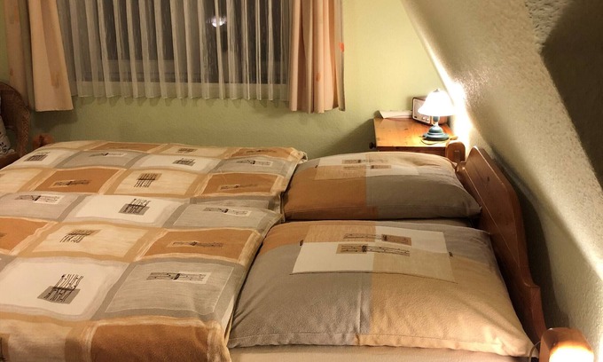 Langeneß Apartamento | Habitación 'Doppelzimmer Nommensen' con jardín compartido, balcón y Wi-Fi