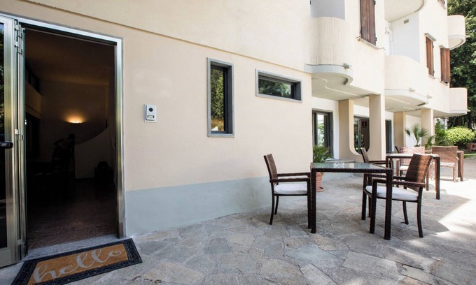 Ronchi Apartamento | Habitación 'Doppia - Letti Singoli' con jardín compartido, Wi-Fi y aire acondicionado.