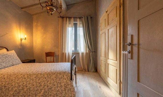 Campiglia d'Orcia Apartamento | Habitación 'L'imbrunire - L'opificio' con jardín compartido, Wi-Fi y aire acondicionado.