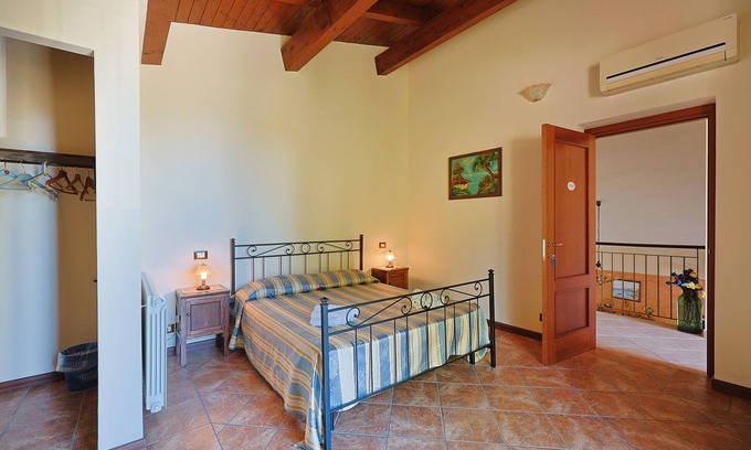 Patti Apartamento | Room 'Lipari' with terrace, shared garden and air conditioning
