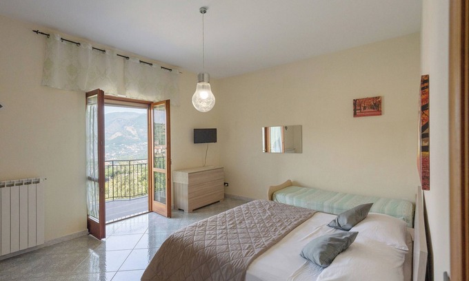 Piazza-Tralia-Pendolo Apartamento | Habitación 'Tripla Con Vista Montagna' con vistas a la montaña, jardín compartido y Wi-Fi
