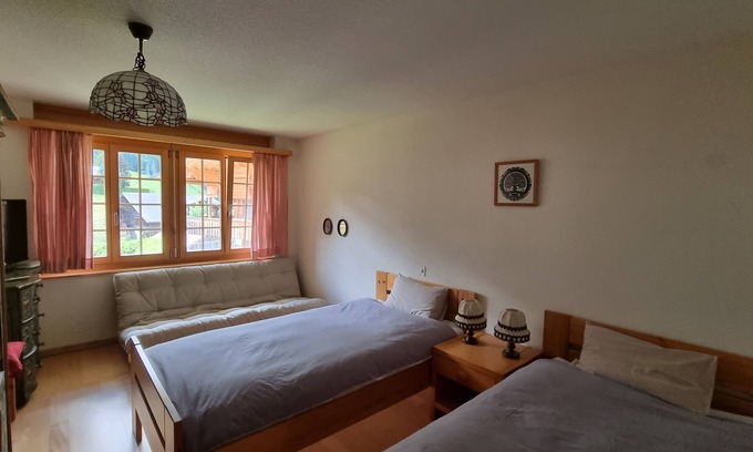 Lauenen Cama Y Desayuno | Room with extra-large double-bed, cable TV, private bathroom, organic breakfast,