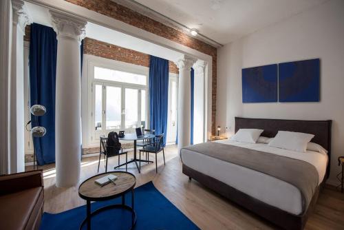 Justicia Hostal | room00 Gran Vía Hostel