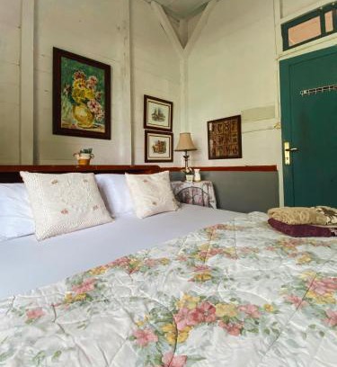 Ambarita Cama Y Desayuno | Ruma Kaca Simanindo Bed&Breakfast