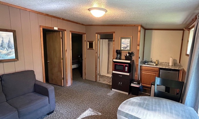 Palmyra Cabina | Rustic cabins in secluded campground with lake access and woods to wander in.