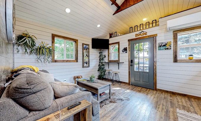 Evergreen Casa | Rustic getaway with fireplace, patio area, board games, full kitchen, & TV