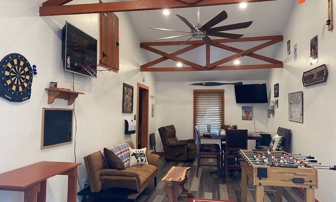 Prudenville Casa | Rustic home on wooded lot, very private. Lake and dock access. Close to trails.