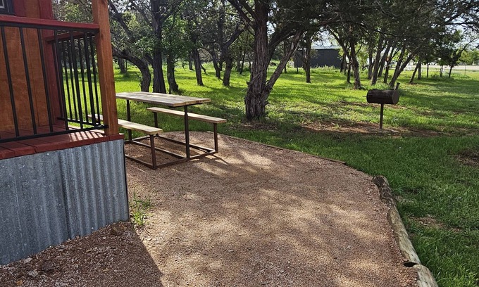 Silver Creek Village Cabina | Rustic one room cabin overlooks Lake Buchanan near Reveille Ranch and Spider Mtn