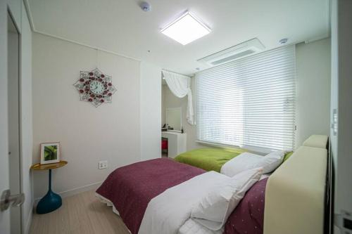 Bongmyeong-dong Apartamento | Sai