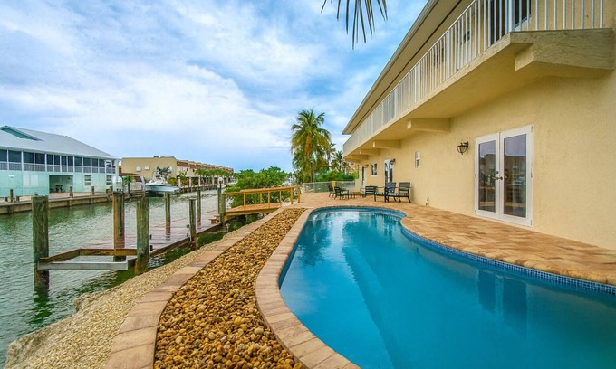 Marathon Casa | Pescadores salados, espacioso paseo marítimo de Sombrero Beach 4 hab con piscina climatizada y muelle