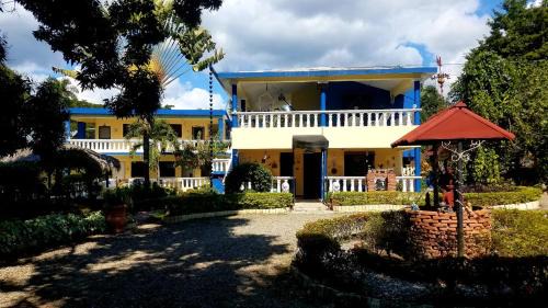 Tamboril Hostal | Sana El Jardin Secreto
