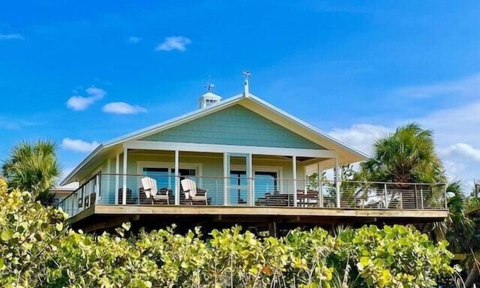 Placida Cabaña | Sand Dollar Cottage: "Old Florida" Retiro frente al mar; Muelle privado