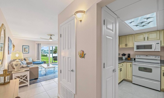 Villa Sabine Condominio | Sand Dollar E111 – Bayfront Bliss in the Heart of Pensacola Beach