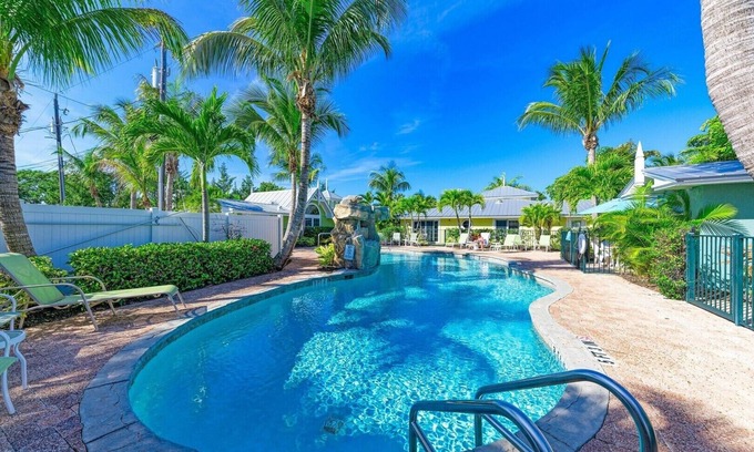 Holmes Beach Casa | Sand Dollar: Poolside Condo 2 Blocks to Beach by Anna Maria Life Vacation Rentals