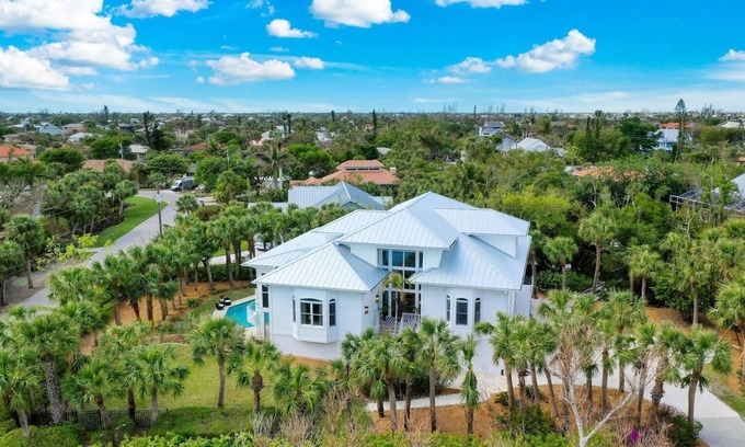 Shell Harbor Casa | Sanibel 6 bedroom Luxury Home with Pool,One Block from Beach,Pier and Canal View