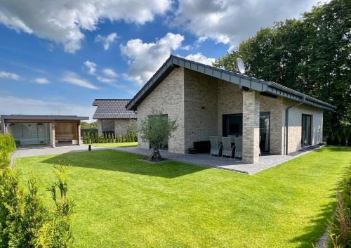 Barssel Casa | Schönes Ferienhaus mit Sauna am Harkebrügger See in der Nähe von Oldenburg