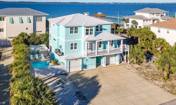 Villa Primera Casa | Stunning Waterfront Home w/ Private Pool and beautiful NEW Tiki Bar!