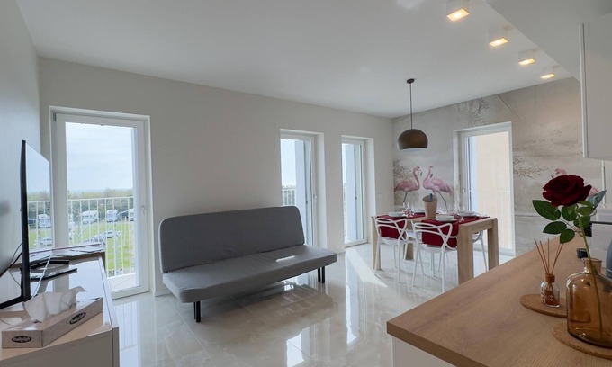 Chioggia Apartamento | Seafront Modern Flamingo Suite by Ca-sa Check