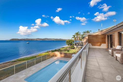 Salamander Bay Casa | Seaside Sanctuary - Waterfront Luxury Home with Heated Pool