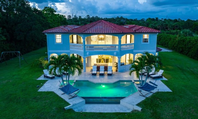 Palm City Casa | Secluded 5000 SF Mansion Waterfront|Game Room|Pool
