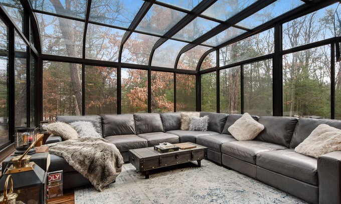 Oxford Casa | Secluded home near the lake with huge sunroom, firepit, gas grill, & private W/D