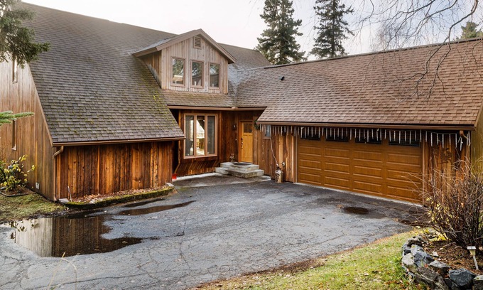 Rabbit Creek Casa | Secluded retreat with lush sunroom, scenic deck, fireplace & W/D