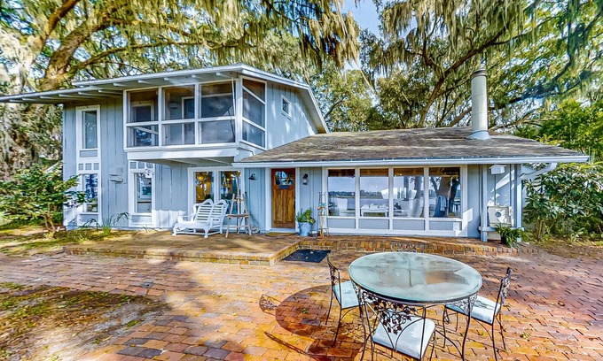 Fernandina Beach Casa | Secluded riverfront home with dock, firepit, grill, river views, patio, & AC