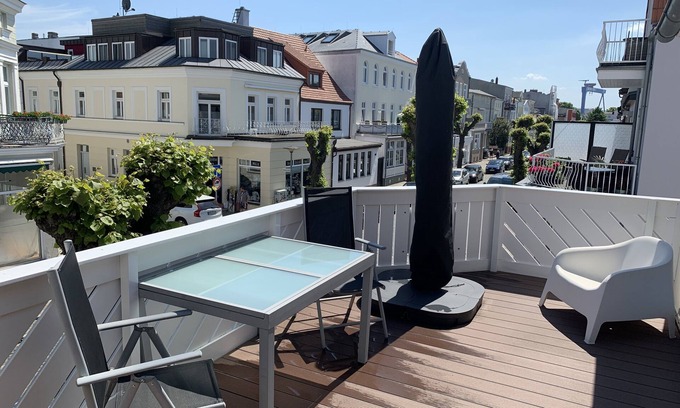 Warnemuende Apartamento | "Seelenstreichler" - 58 metros cuadrados con terraza soleada y chimenea de madera - Centro