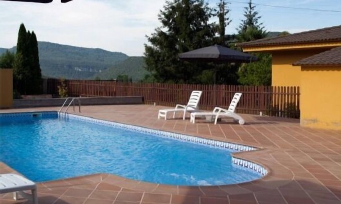 Sant Esteve de Llémena Cabaña | Casa rural (alquiler íntegro) La Roureda para 12 personas con piscina privada