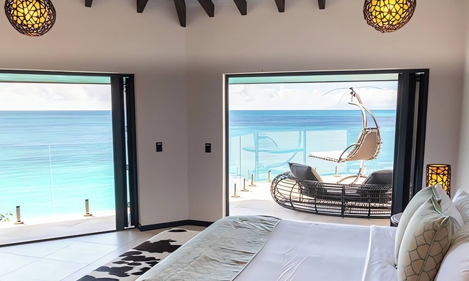 Fryes Beach Hotel | Serene Oceanfront Room w/ Stunning Caribbean Sunset Views & Direct Beach Access