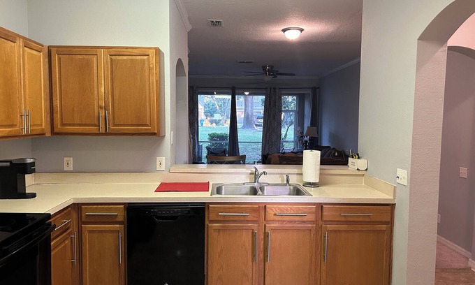 Tampa Casa | Serene & Spacious Townhome. Two story townhome in a quiet community.