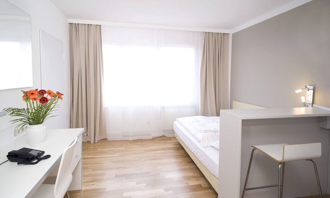 Langen Apartamento | Apartamento con servicio incl. WLAN gratis, estacionamiento gratuito y limpieza quincenal