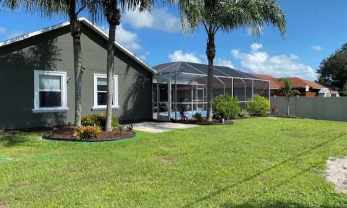 Port Malabar Casa | Short drive to the beach, or stay by the pool.