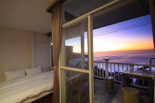 Zhushan Cama Y Desayuno | Sky lounge B&B