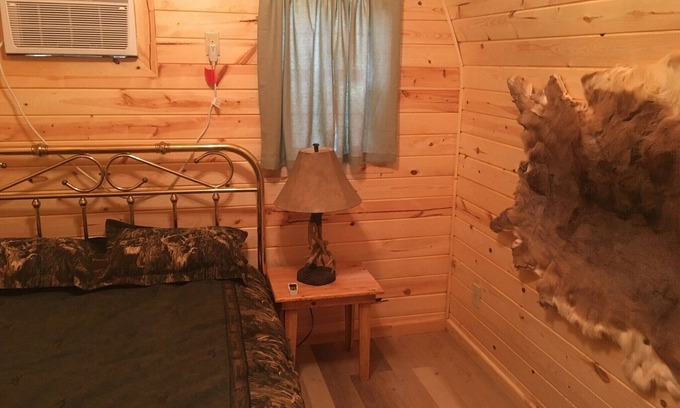 Hugo Casa | Small one room cabins with no bathrooms hot tub and covered picnic tables.