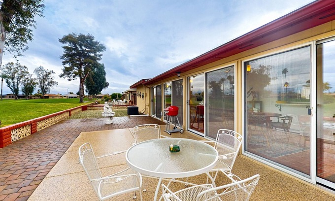 Sunland Village Casa | Snowbird-friendly golf-front home with pool, hot tub, grill, smart TVs, W/D, AC