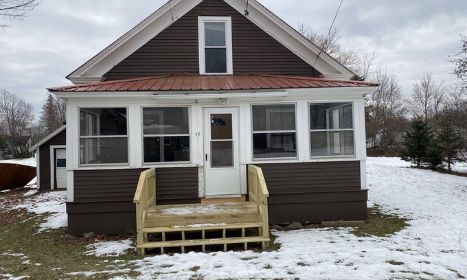 Patten Casa | Snowmobile trail access. Room for multi-vehicle/trailer parking.
