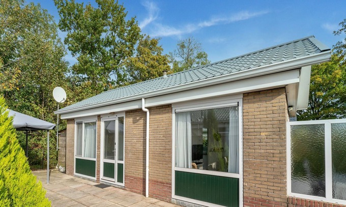 Baarland Casa | Cómoda casa de vacaciones con jardín en Baarland