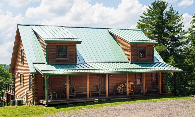 Meadows Of Dan Cabina | Soak in the hot tub @ Stonewood Manor - Where Luxury and Cozy Meet.