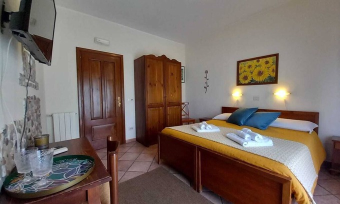 Villagonia Apartamento | Habitación 'Girasole' con balcón, Wi-Fi y aire acondicionado