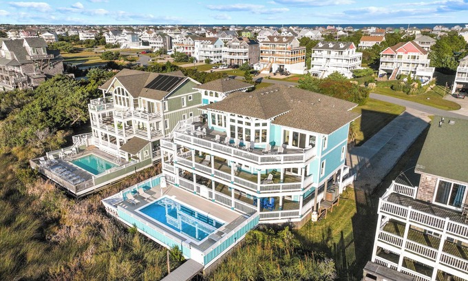 Wind Over Waves Casa | Soundfront, Pool, Hot Tub, Elevator, Private Dock, Boat Ramp, & Game Room