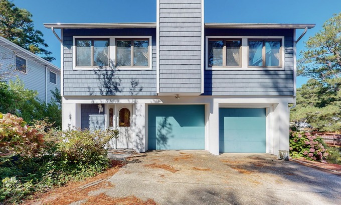South Bethany Harbor Casa | South Bethany canal-front house w/ grill, boat dock, and outdoor shower