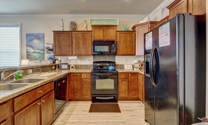 Wilmington Beach Casa | Southern Belle Disfrute de los vientos del sur y espectaculares vistas desde el porche