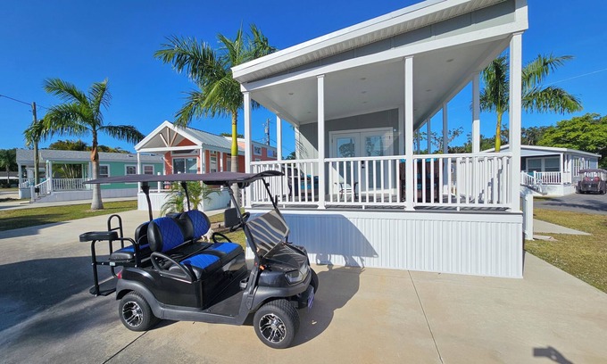 Kissimmee Casa | 1 BEDROOM DISNEY AREA RENTAL WITH GOLF CART AWARD WINNING "MILL CREEK RESORT"
