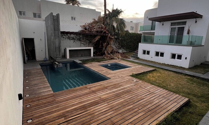 Delicias Casa | Spacious 4-bedroom house with WiFi, Pool, fitness room in welcoming Delicias