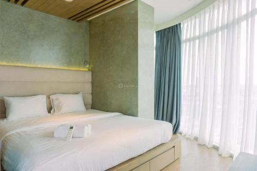 Cikokol Apartamento | Spacious and Homey 2BR at Tree Park City Cikokol Apartment By Travelio