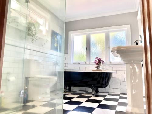 Mount Albert Casa | Spacious and Sunny Master Bedroom with shared bathrooms